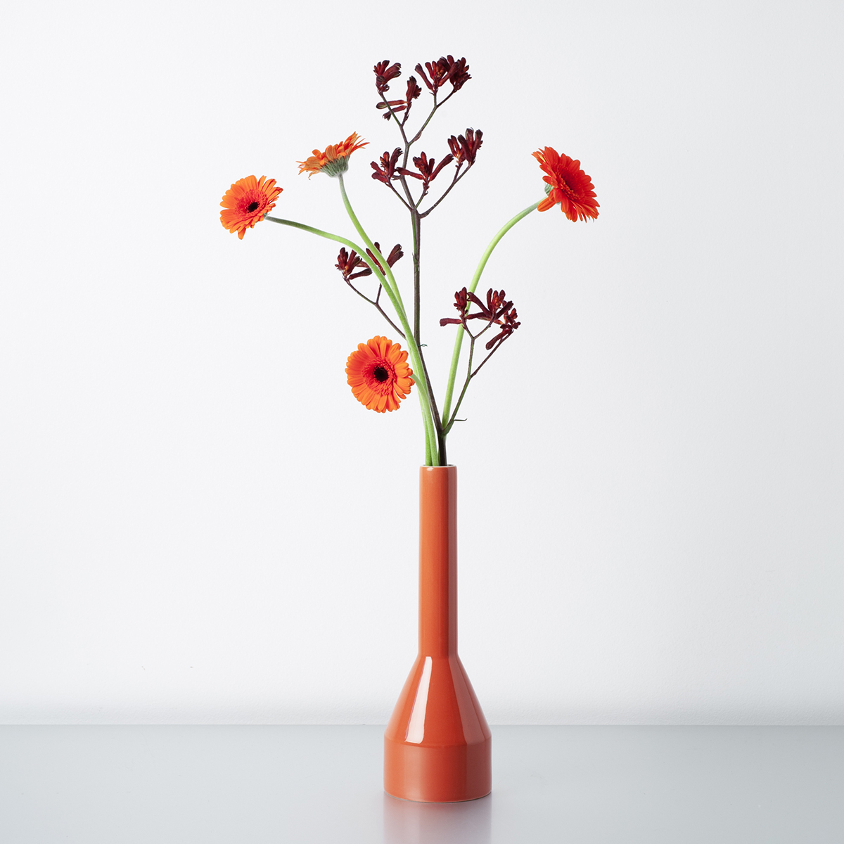 Soliflore design en céramique orange